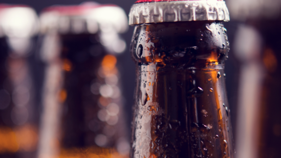 Close-up of beverage bottles representing Vxceed’s seamless migration to Lighthouse 3.0 for a leading beverage brand in Myanmar.